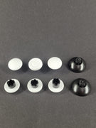 Acht schwarze und weiße Swap Stick Aufsätze und Basen für PS5 Controller