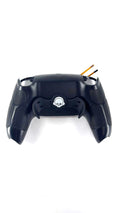 Schwarze PS5 Rückschale mit gummiertem Waben-Grip und integriertem Scull V3 Paddle