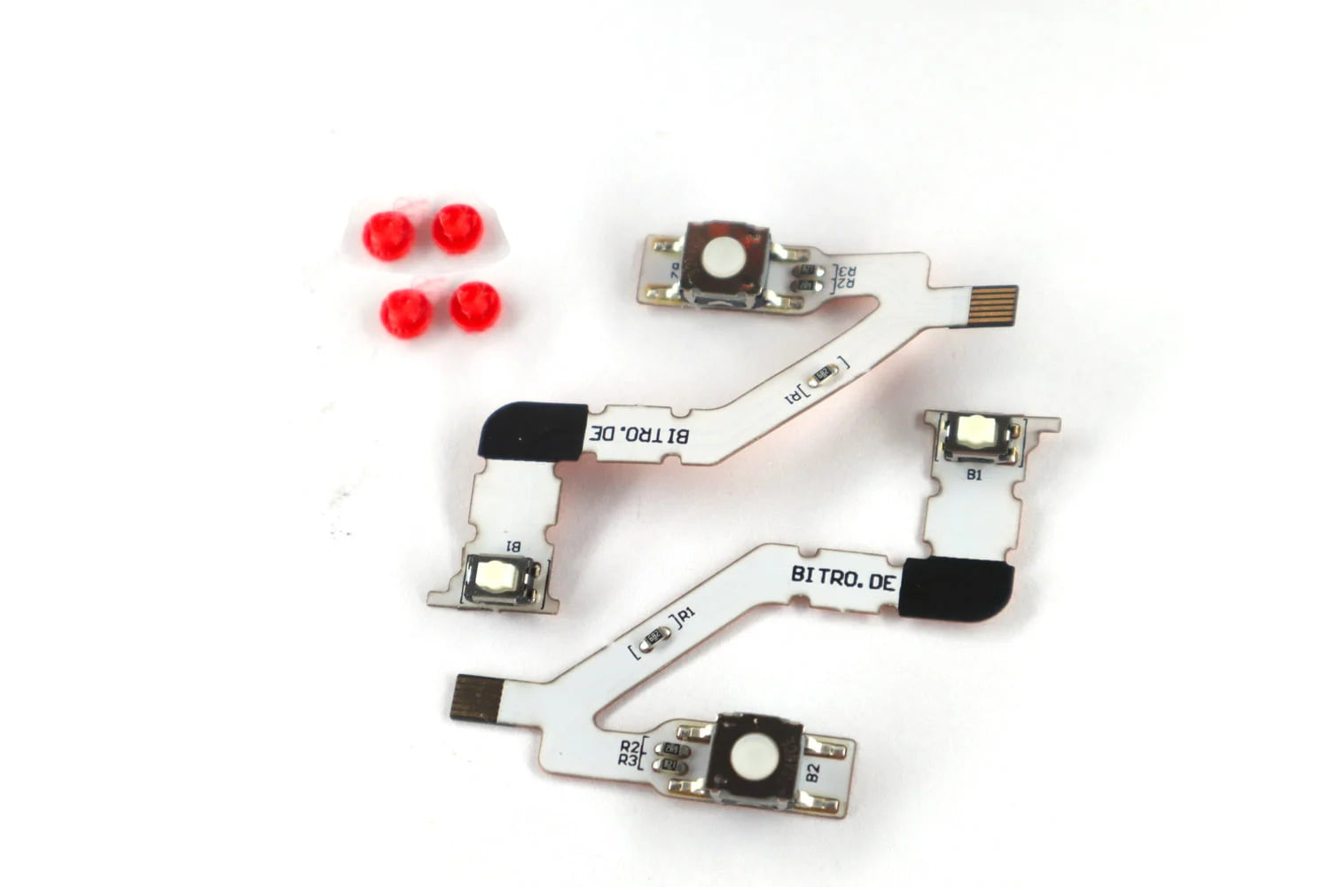 Vier PS5 Smarttrigger Flexkabel mit digitalen Mikroschaltern und roten Silikonkappen