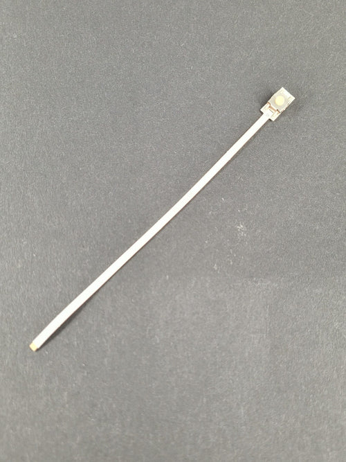 Weißes Flexkabel mit gelbem Silikon Taster und goldenen Kontakten
